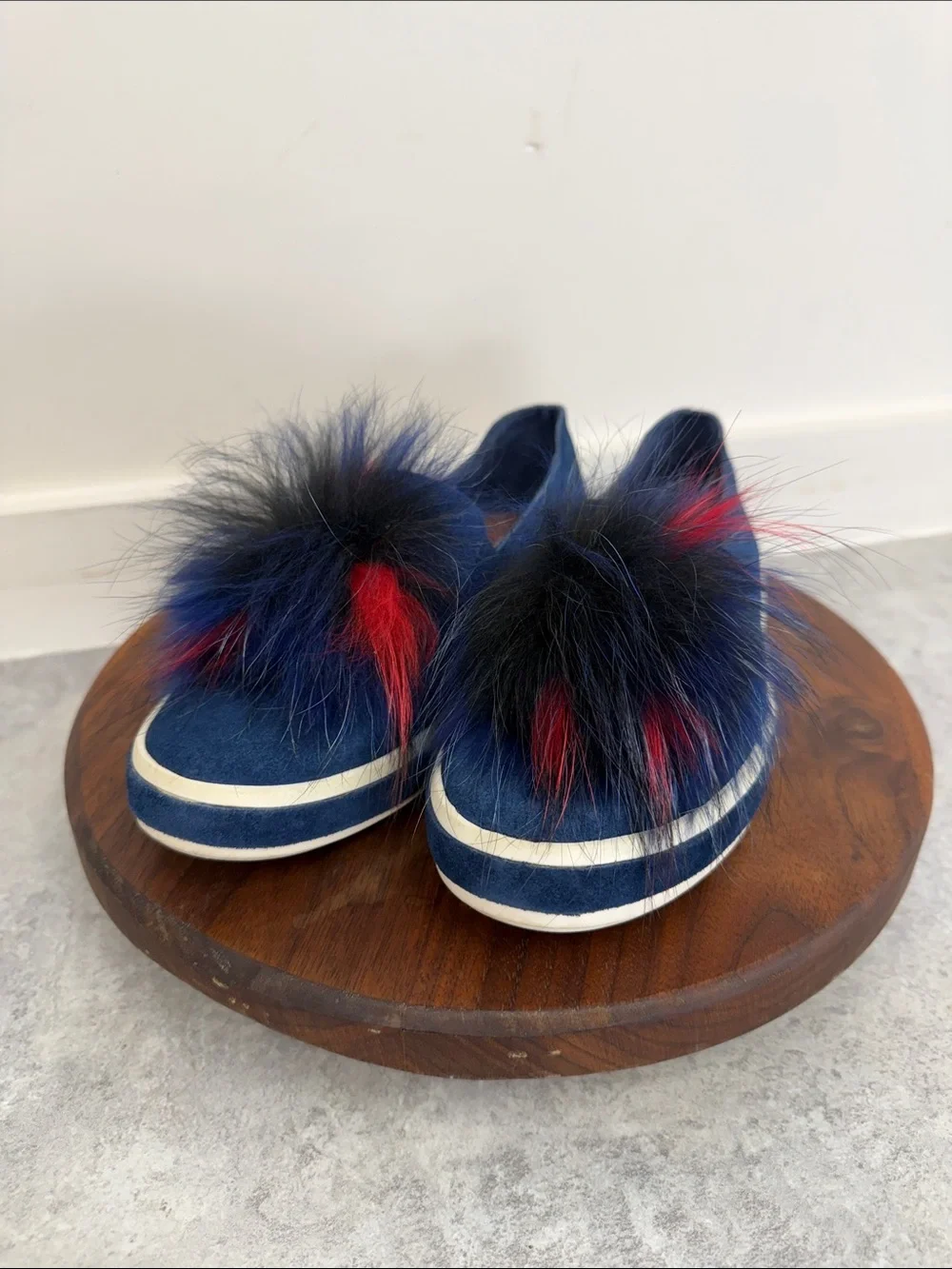 Sondra Roberts Navy Slip-On Sneakers with Red and Black Faux-Fur Poms‎